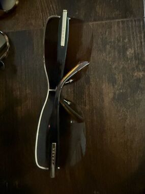 Prada Men’s Black Sunglasses with Silver Accents